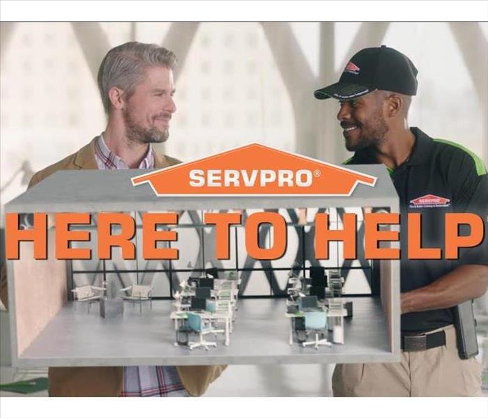 SERVPRO technician with customer