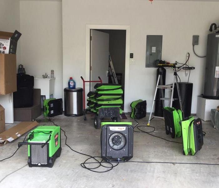 Drying equipment in a garage.