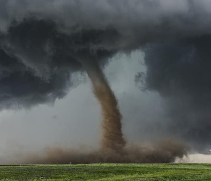 Tornado on a field.